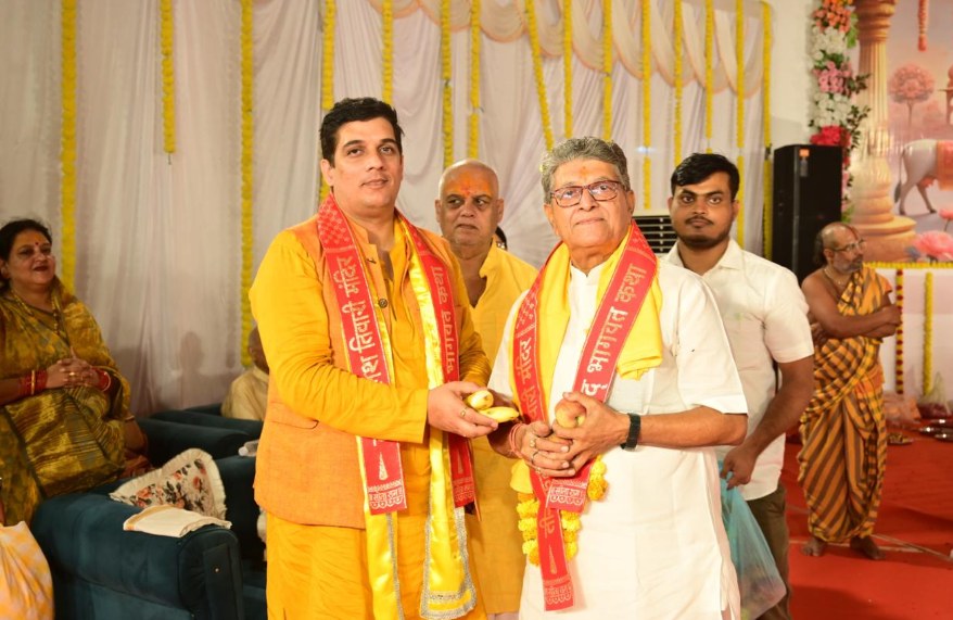 Two devotees honoured with sashes